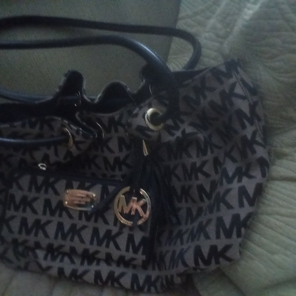 Michaels Kors Cinched Bag With Matching Wallet.
